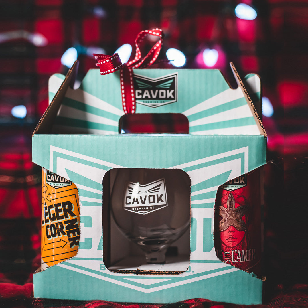 A Gift box of four Cavok Beer Cans and one Cavok Beer Glasse
