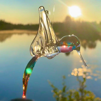 a  colorful glass hummingbird ornament from Glass roots