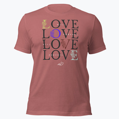 a pink T-shirt with the sentence: "Love will Prevail" on it