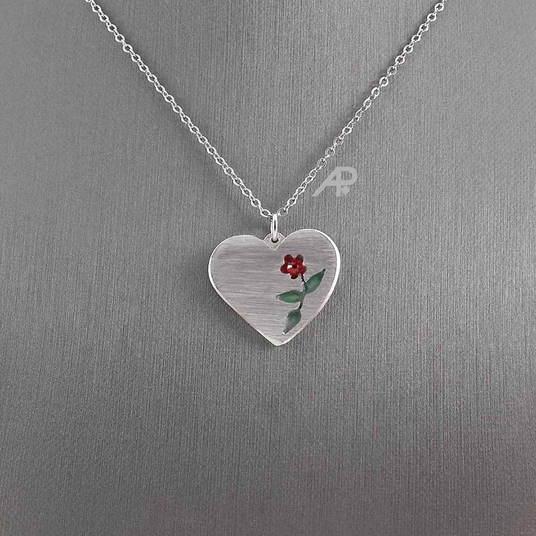 Pendentif coeur et fleur