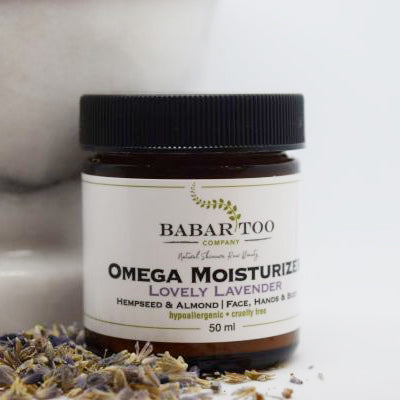 a jar of Lovely Lavender Omega Moisturizer from Babar Skincare with a lid