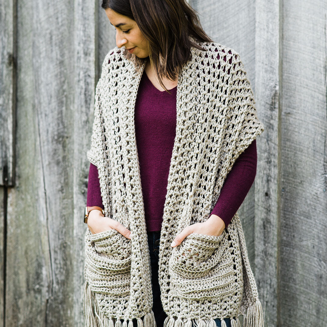 a person wearing a Pocket Shawl from Fetchingly Handmade 
