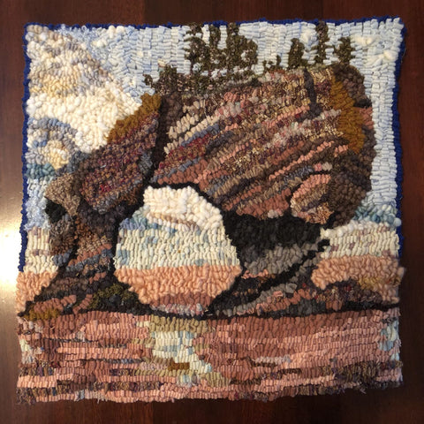 Motif d'accrochage de tapis
