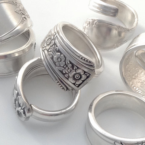 a group of silver Spoon Rings