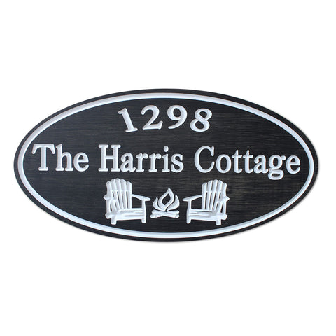 Cottage Sign with Adirondack Chairs and Fire